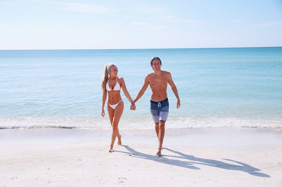 kim and austin at the beach